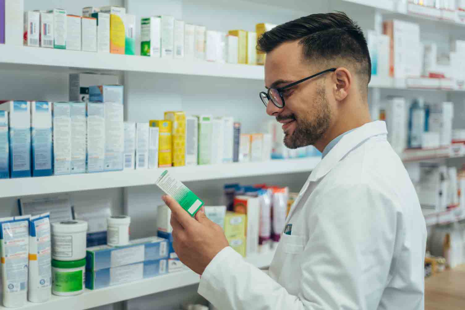 Pharmacist reviewing prescription medications